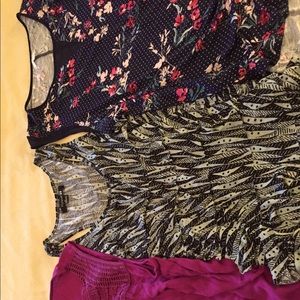 Three women’s tank tops size large.